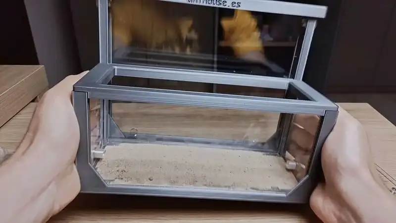 Leveling the sand inside the Anthouse sand nest