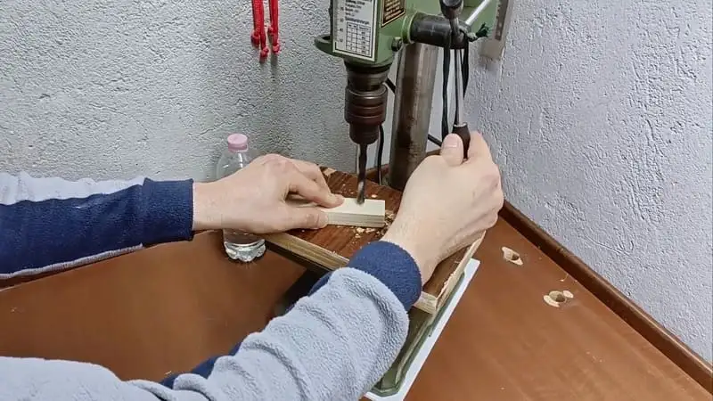 Drilling the holes in the DIY tube spiral for ants