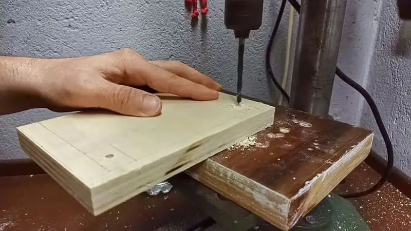 Drilling the holes in the DIY tube spiral for ants