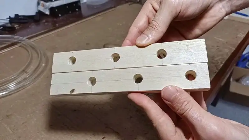 The holes in the two towers of the DIY tube spiral for ants