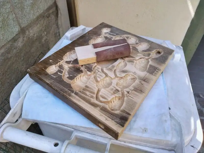 Sanding a DIY wooden ant nest