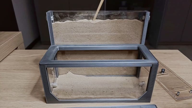 Leveling the sand in the Anthouse sand nest