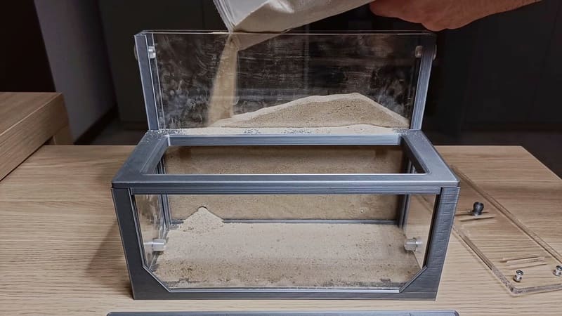 Filling the Anthouse sand nest with sand